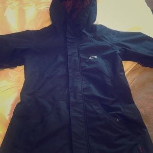 Women's Oakley snowboarding set.